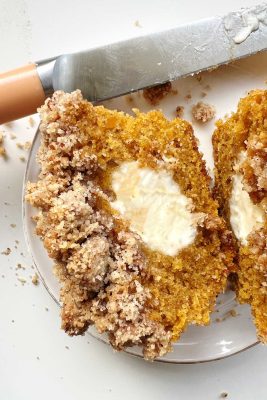 cream cheese pumpkin streusel muffin cut in half