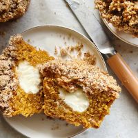 pumpkin cream cheese struesel muffins cut in half