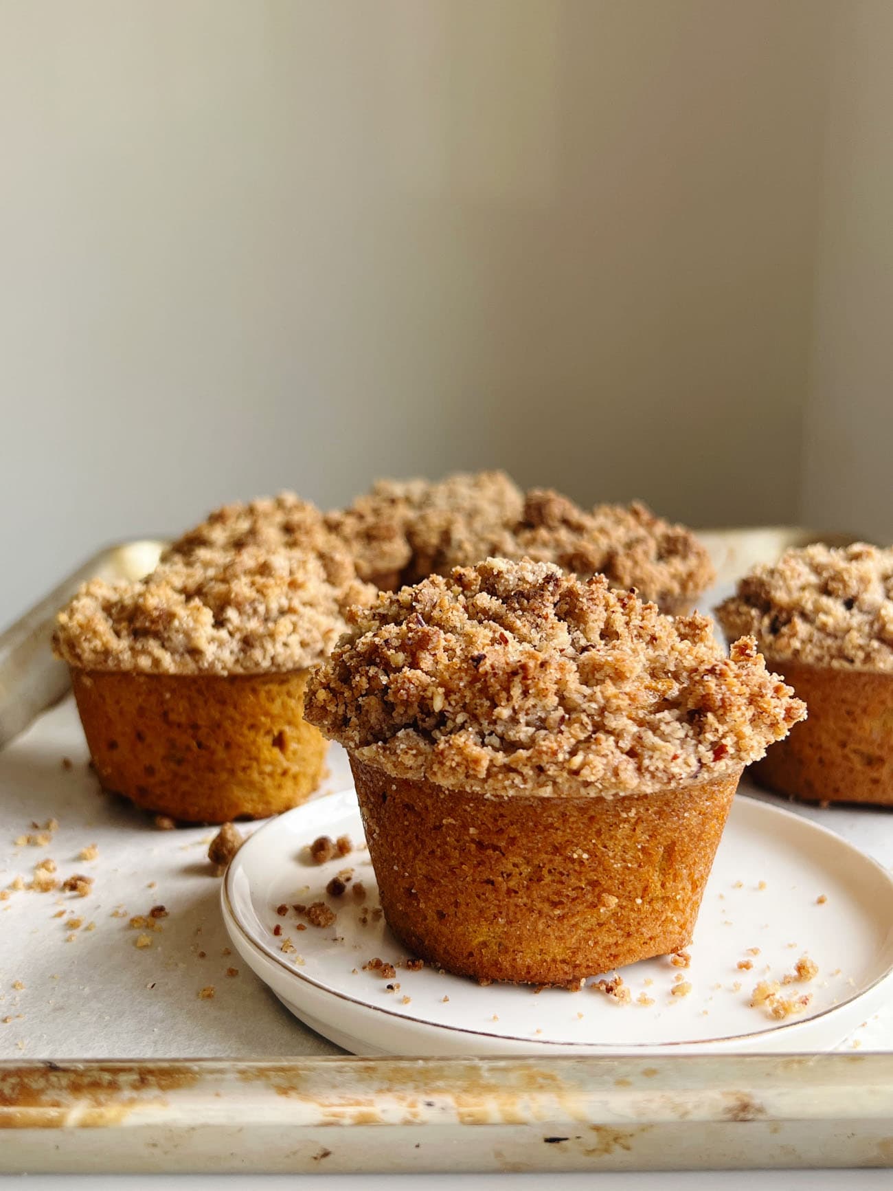 pumpkin streusel muffins on a plate