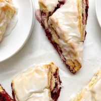 raspberry scones on parchment paper