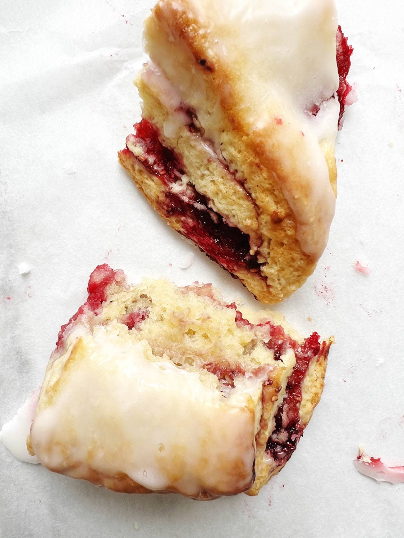 raspberry scones on parchment paper