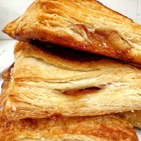 puff pastry apple turnovers, closeup image