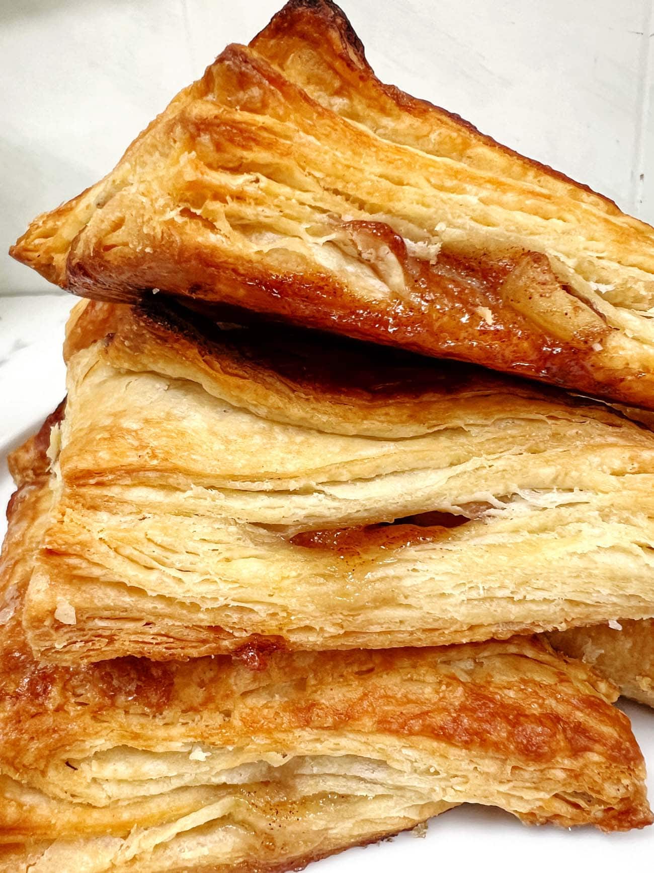 puff pastry apple turnovers, closeup image