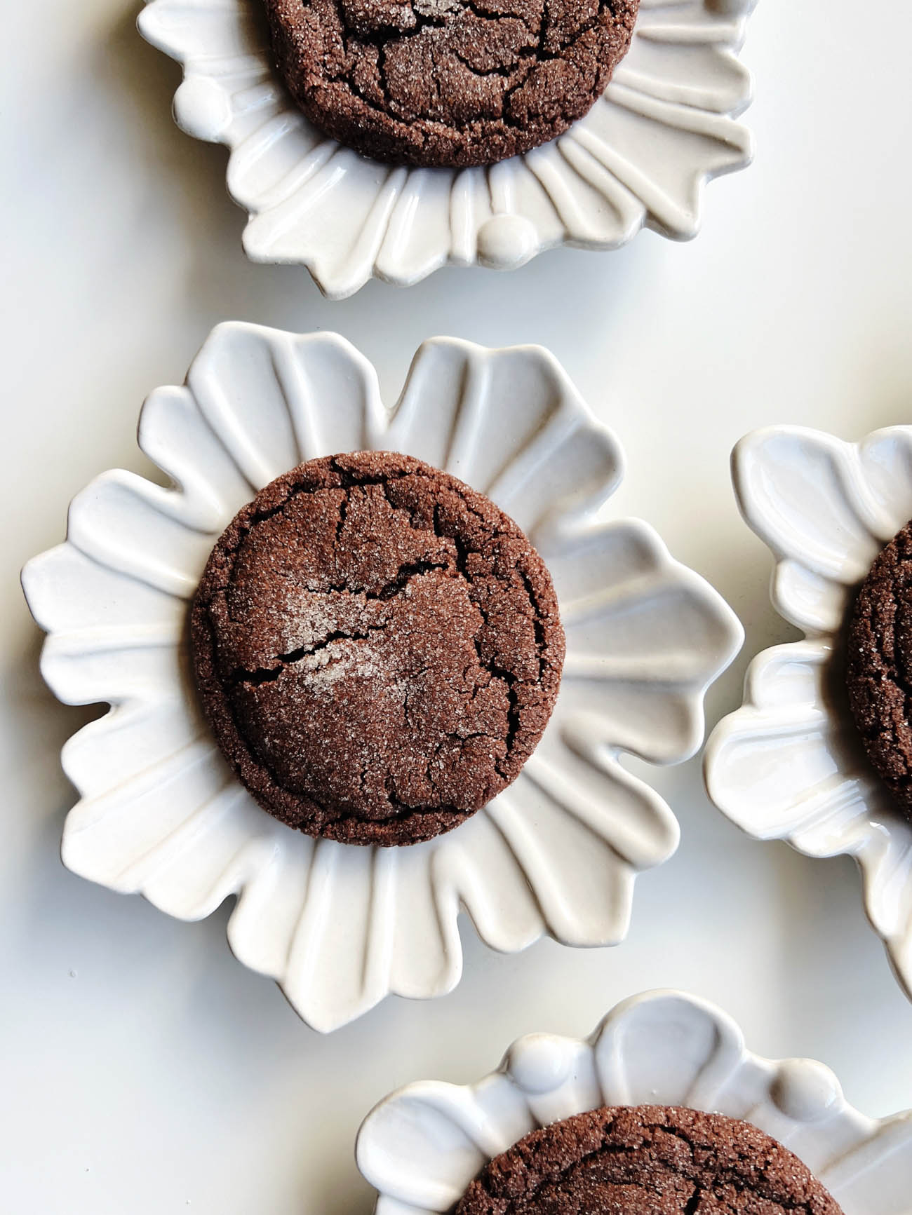 chocolate sugar cookies on snowflakes plates