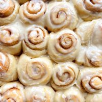 mini orange cinnamon rolls in a pan