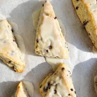 chocolate chip scones on white parchment paper