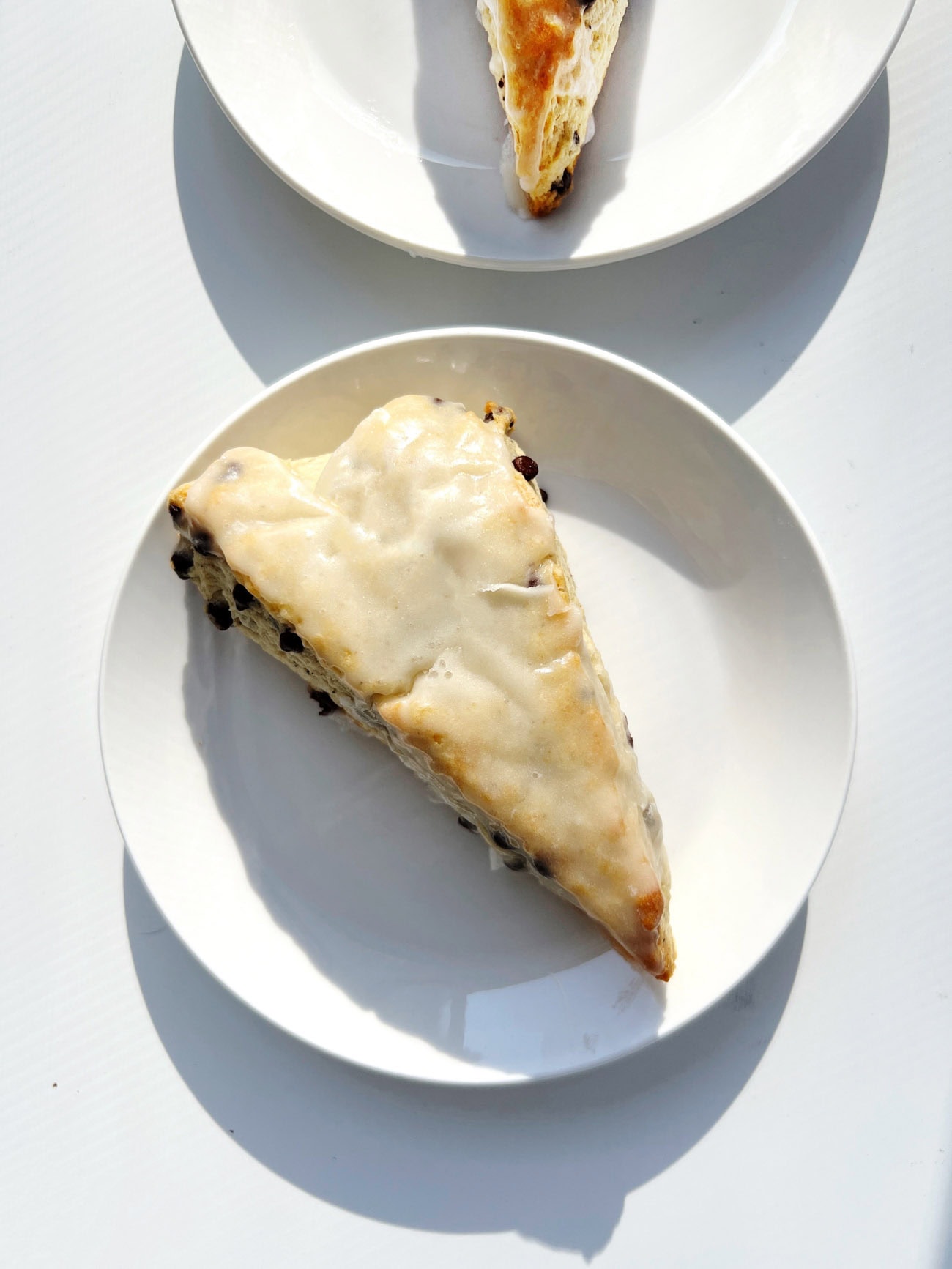 chocolate chip scones on white plate