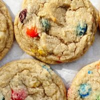 m&m cookies on parchment paper