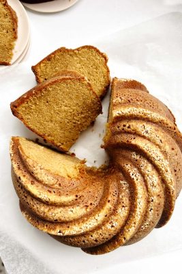 toasted sesame sourdough bundt cake on parchment paper